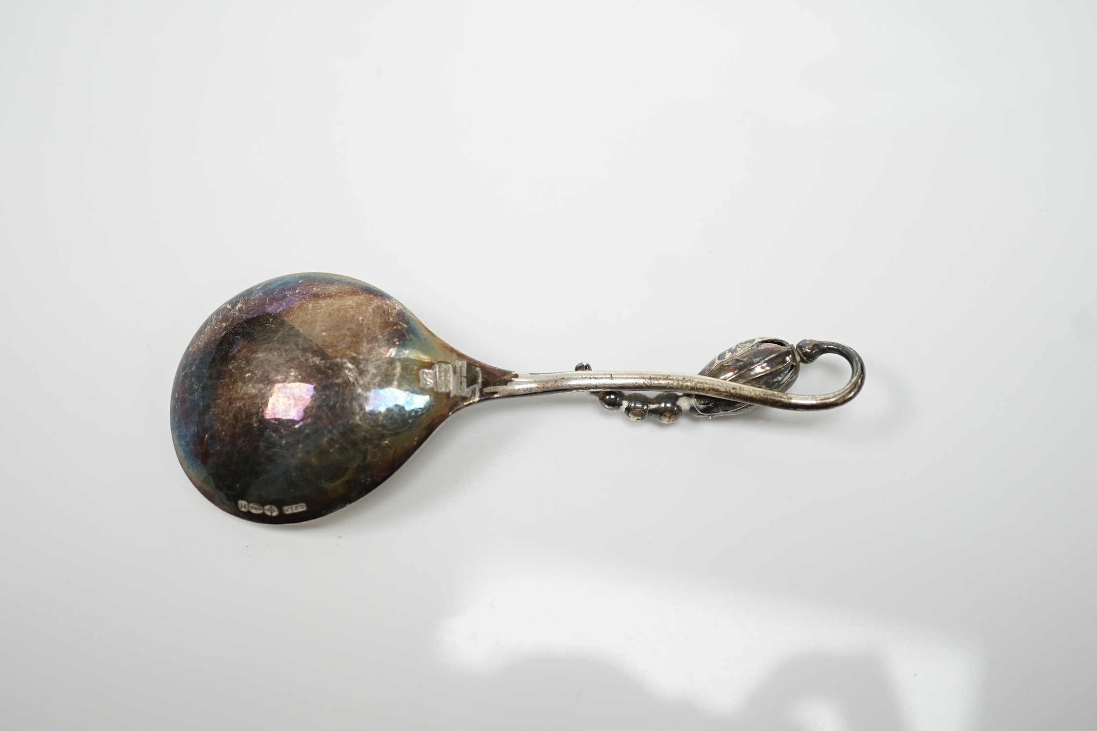 A George VI Georg Jensen silver blossom pattern caddy spoon, import marks for 1948, no.84, 10.2cm.